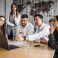 Group of people working out business plan in an office